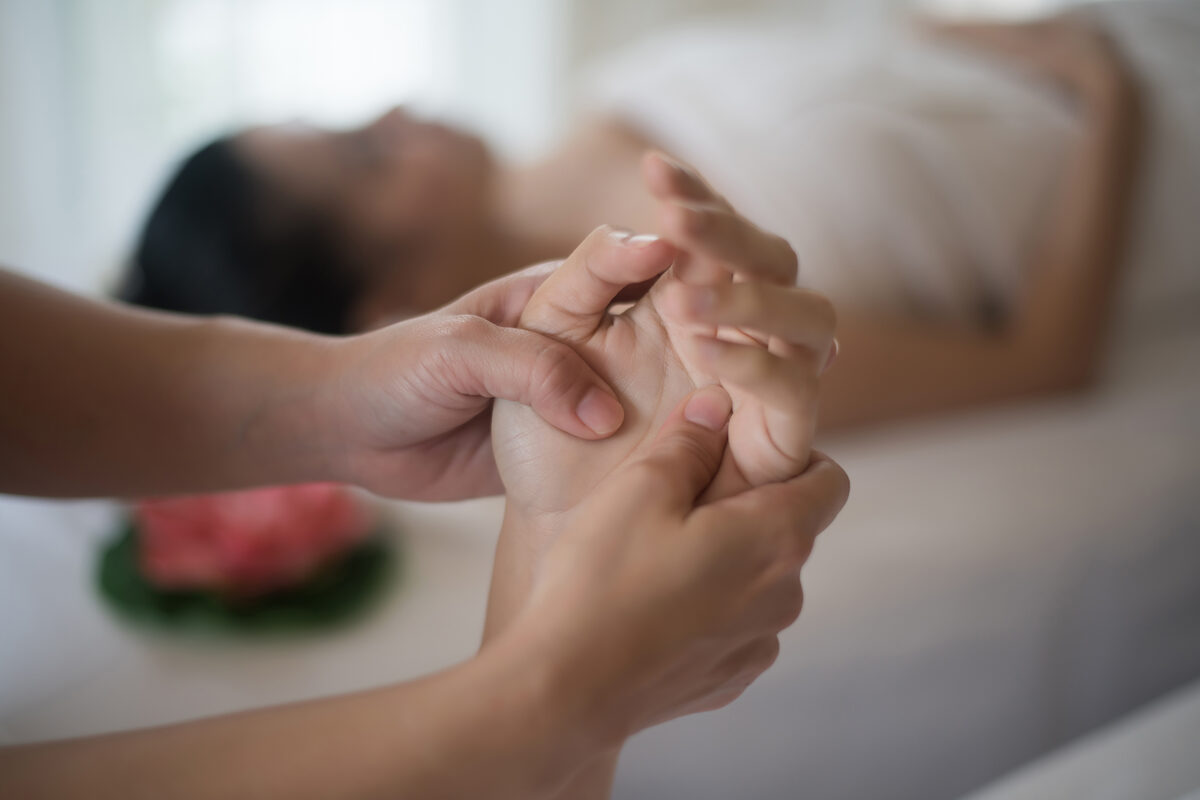 Healing hands during a bodywork session